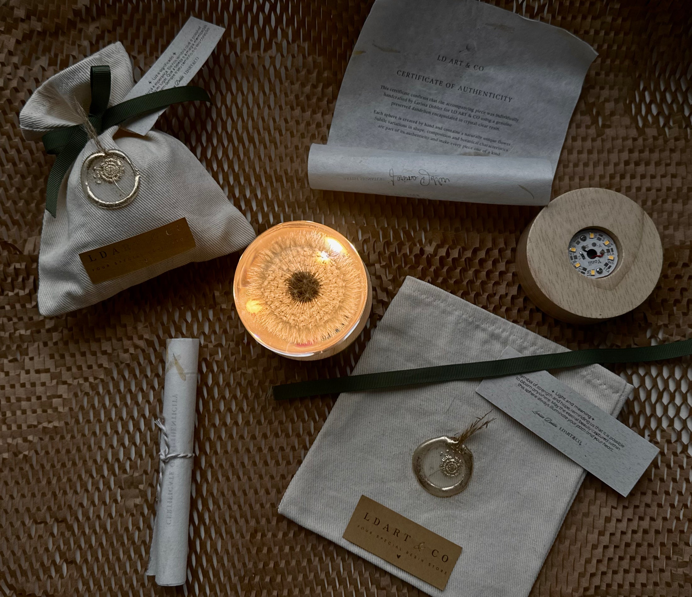 Dandelion sphere, illuminated base, dust bag, certificate and care card